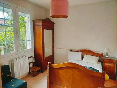 Un ou plusieurs lits dans un hébergement de l'établissement Au petit Ruisseau, maison à Capbreton