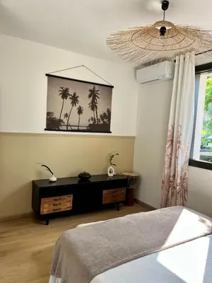 Un ou plusieurs lits dans un hébergement de l'établissement Villa Christelle