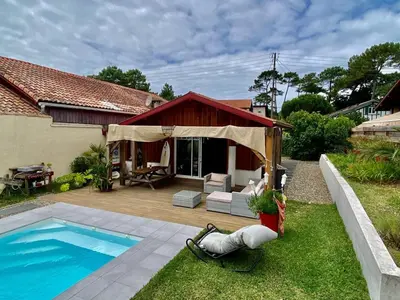 Piscine de l'établissement Maison avec jardin et accès Wi-Fi à Capbreton - FR-1-413-260 ou située à proximité