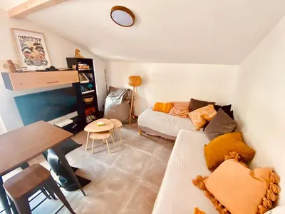Coin salon dans l'établissement Maison avec jardin et accès Wi-Fi à Capbreton - FR-1-413-260
