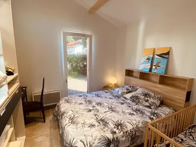 Un ou plusieurs lits dans un hébergement de l'établissement Maison avec jardin et accès Wi-Fi à Capbreton - FR-1-413-260