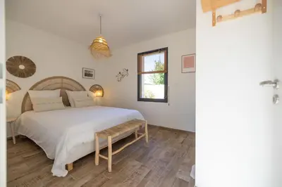 Un ou plusieurs lits dans un hébergement de l'établissement Villa vacances Bassin d'Arcachon