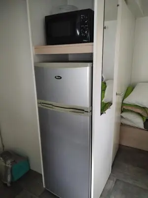 Cuisine ou kitchenette dans l'établissement Camping rivages des Landes