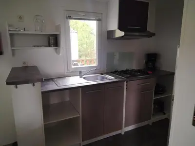 Cuisine ou kitchenette dans l'établissement Camping rivages des Landes