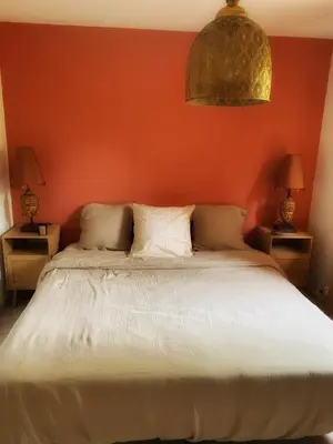 Un ou plusieurs lits dans un hébergement de l'établissement Maison paisible avec jardin - proche du lac de Sanguinet
