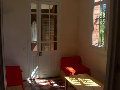 Coin salon dans l'établissement Maisonnette dans parc de 4 ha