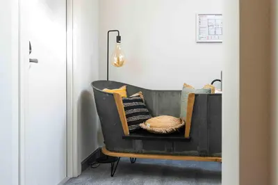 Coin salon dans l'établissement Logis Hôtels Gnàc é Pause