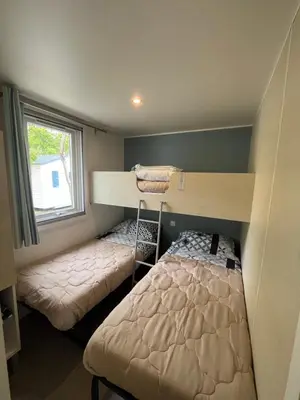 Un ou plusieurs lits dans un hébergement de l'établissement Mobilhome Sauvage