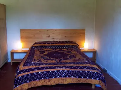 Un ou plusieurs lits dans un hébergement de l'établissement Chalet au coeur d'un parc de 4 ha