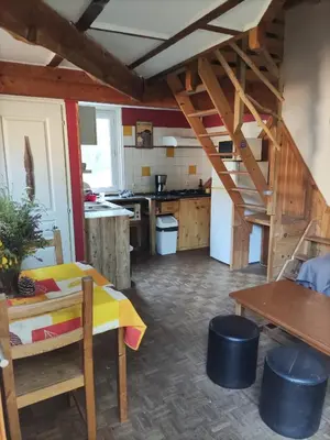 Cuisine ou kitchenette dans l'établissement Chalet atypique