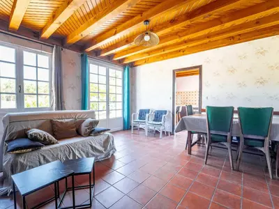 Coin salon dans l'établissement Maison 6 pers à Vielle-Saint-Girons - Jardin et parking - FR-1-50-186
