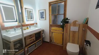 Salle de bains dans l'établissement Maison avec rivière