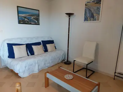 Un ou plusieurs lits dans un hébergement de l'établissement Appartement T2 au centre de Vieux-Boucau avec parking privé, proche des plages - FR-1-239-1136