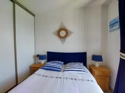 Un ou plusieurs lits dans un hébergement de l'établissement Appartement T2 au centre de Vieux-Boucau avec parking privé, proche des plages - FR-1-239-1136