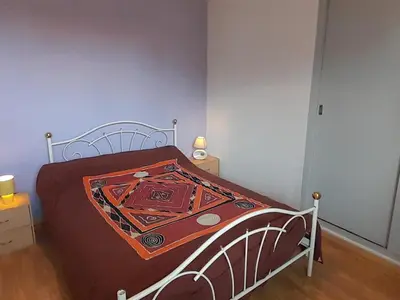 Un ou plusieurs lits dans un hébergement de l'établissement Maison 2 chambres, proche plage et commerces à Capbreton - FR-1-239-1137