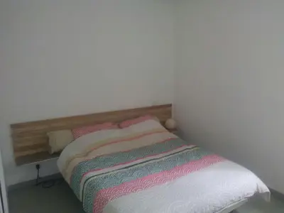 Un ou plusieurs lits dans un hébergement de l'établissement Entire Apartment in St Vincent de Tyrosse