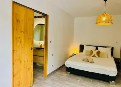 Un ou plusieurs lits dans un hébergement de l'établissement Villa d'exception à Capbreton proche des plages