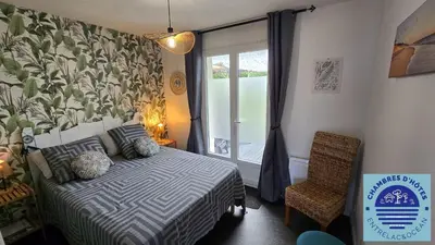 Un ou plusieurs lits dans un hébergement de l'établissement EntreLac&Océan3 - entrée et terrasse privée