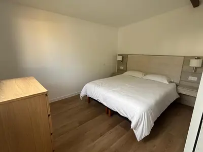 Un ou plusieurs lits dans un hébergement de l'établissement DACSE-VILLAGE - Gite 03