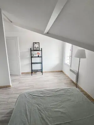 Un ou plusieurs lits dans un hébergement de l'établissement Capbreton à pied tout simple