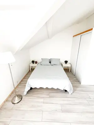 Un ou plusieurs lits dans un hébergement de l'établissement Capbreton à pied tout simple
