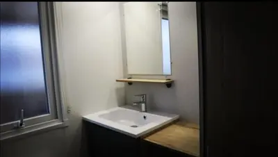 Salle de bains dans l'établissement CONTIS- Océan