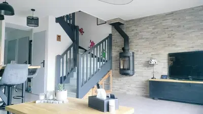 Télévision ou salle de divertissement dans l'établissement maison proche ocean