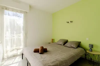 Un ou plusieurs lits dans un hébergement de l'établissement Le nid montois - centre - parking - balcon - wifi - lave linge et vaisselle
