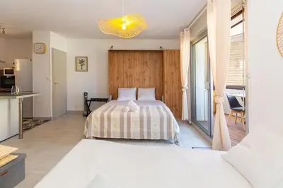 Un ou plusieurs lits dans un hébergement de l'établissement Atlantic Selection - Studio Ivato, au Port de Capbreton