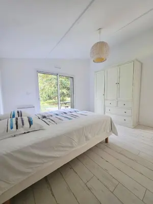 Un ou plusieurs lits dans un hébergement de l'établissement Maison confortable 6 pers Lac Sanguinet