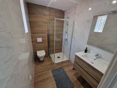 Salle de bains dans l'établissement Plein centre Mimizan Bourg