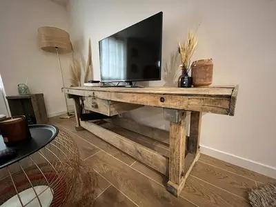 Télévision ou salle de divertissement dans l'établissement Gîte DouDou