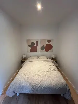 Un ou plusieurs lits dans un hébergement de l'établissement Hébergement GÎTE Domaine de Pinsol