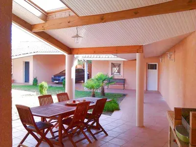 Coin salon dans l'établissement Villa Temara à Soustons Plage , piscine , Golf, Lac Marin