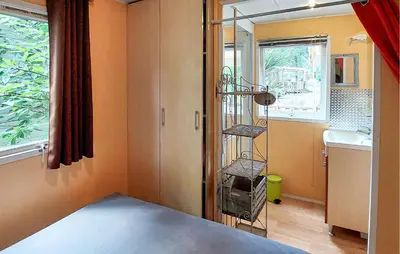 Un ou plusieurs lits dans un hébergement de l'établissement Cozy Stacaravan In Saint-Paul-Lès-Dax