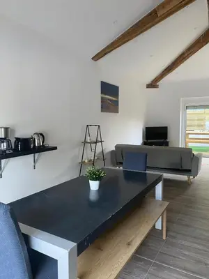 Télévision ou salle de divertissement dans l'établissement L'orangerie