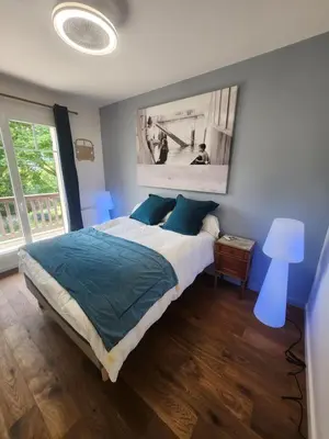 Un ou plusieurs lits dans un hébergement de l'établissement Villa Piscine près Golf Arcachon