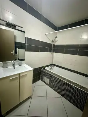 Salle de bains dans l'établissement Residence du littoral