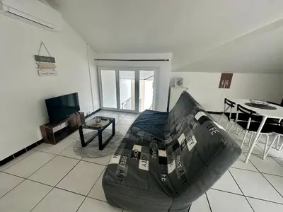 Télévision ou salle de divertissement dans l'établissement Appartement calme et lumineux