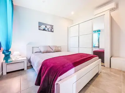 Un ou plusieurs lits dans un hébergement de l'établissement Villa Villa les Verdiers by Interhome