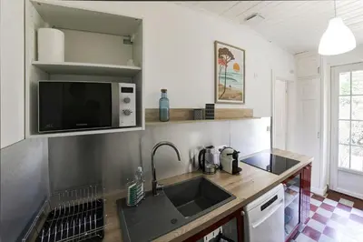 Cuisine ou kitchenette dans l'établissement El Dar - A 1 km de la plage