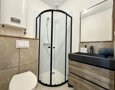 Salle de bains dans l'établissement La Scène de Molière - Neuf - Clim - Central - Fibre