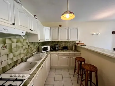Cuisine ou kitchenette dans l'établissement Mes vacances au Pyla