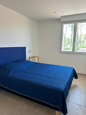 Un ou plusieurs lits dans un hébergement de l'établissement Logement entier Appartement