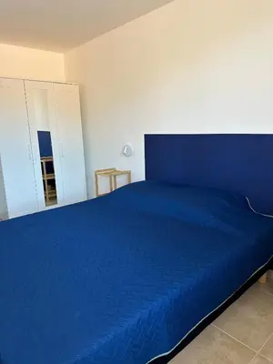 Un ou plusieurs lits dans un hébergement de l'établissement Logement entier Appartement