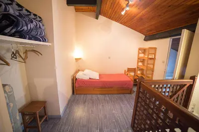 Un ou plusieurs lits dans un hébergement de l'établissement Appartements Les Déferlantes Mimizan-plage