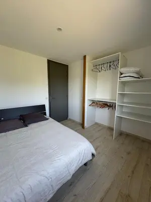 Un ou plusieurs lits dans un hébergement de l'établissement Maison de campagne - Laglorieuse