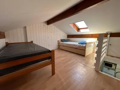 Un ou plusieurs lits dans un hébergement de l'établissement Maisonnette 4-5 pers - proche lac & Océan