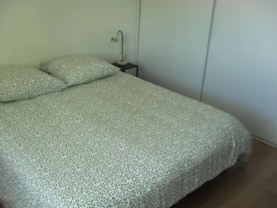 Un ou plusieurs lits dans un hébergement de l'établissement Chambre Capbreton