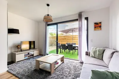 Coin salon dans l'établissement Maison vacances à Labenne